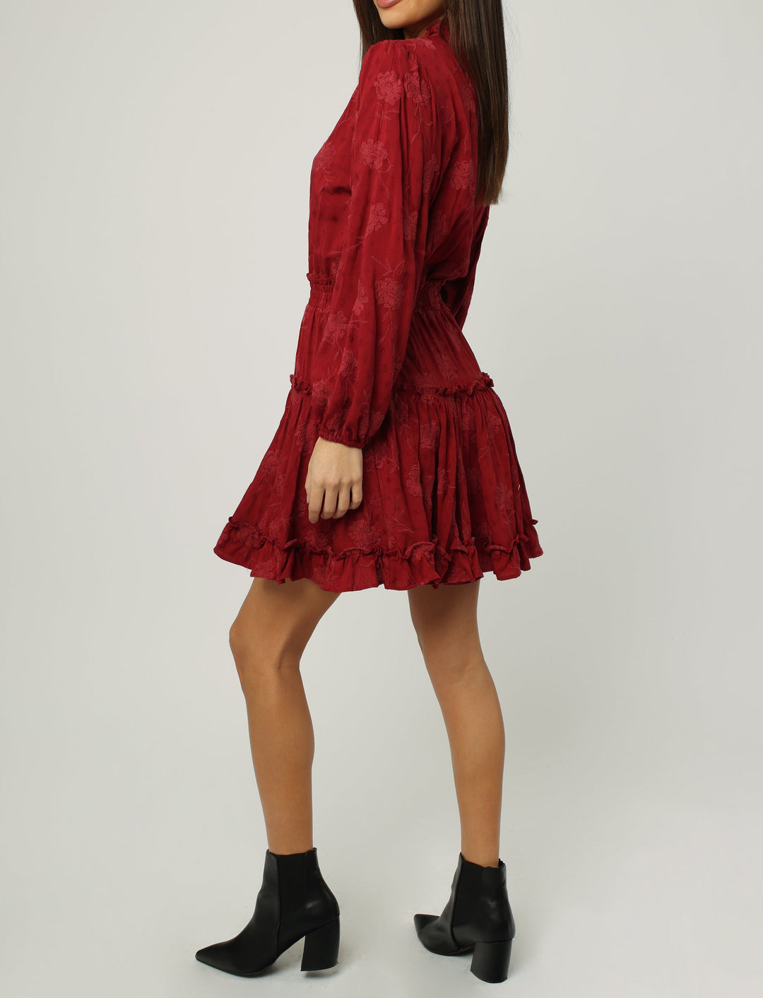 image of a female model wearing a ABELLA LONG SLEEVE NECK TIE DRESS RED DAHLIA DRESSES