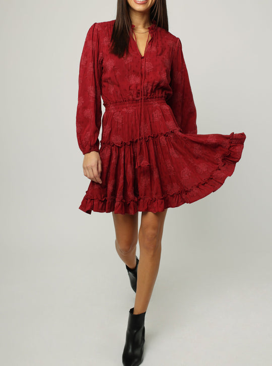 image of a female model wearing a ABELLA LONG SLEEVE NECK TIE DRESS RED DAHLIA DRESSES