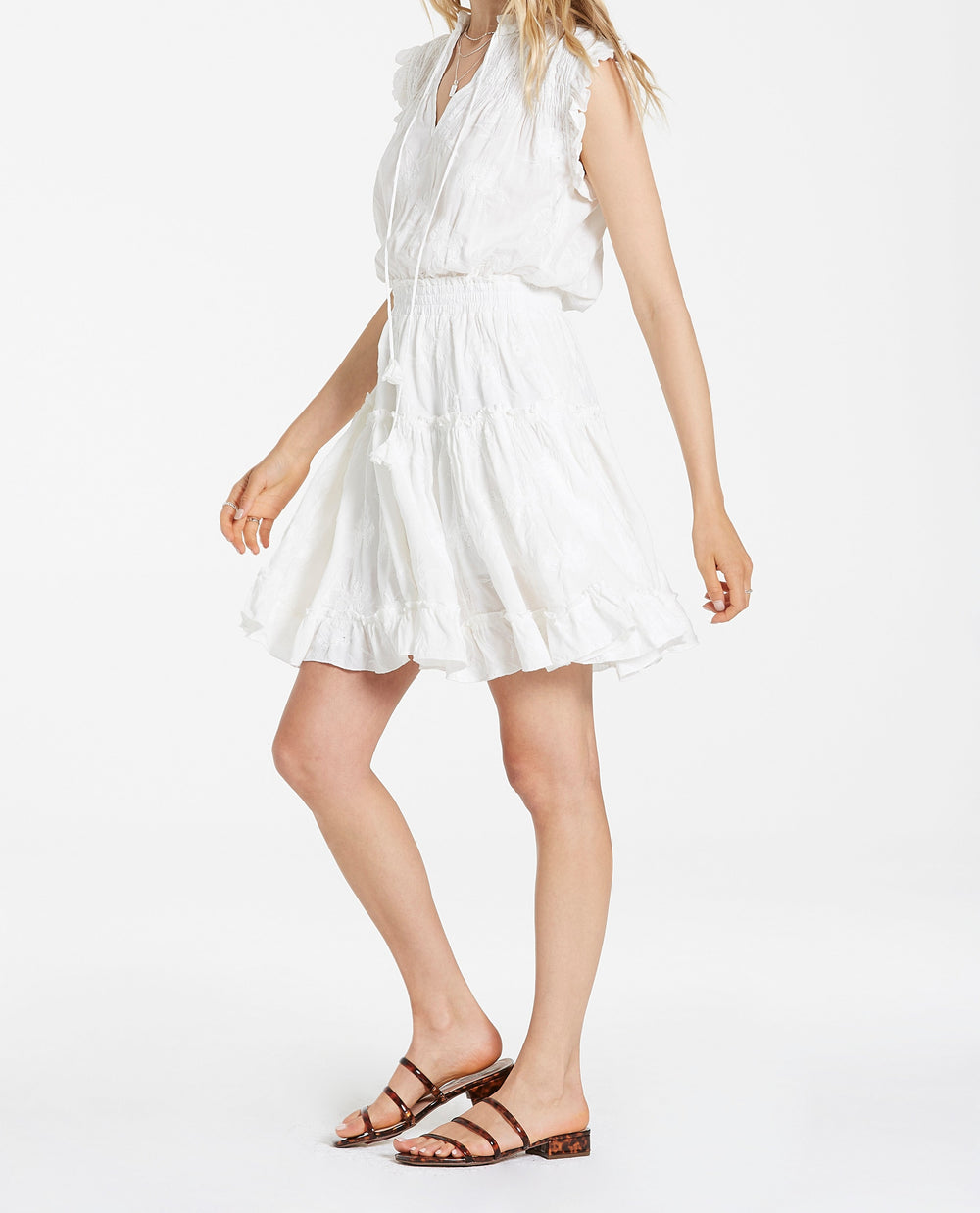 image of a female model wearing a MELODIE TIERED RUFFLE DRESS PEARLED IVORY FLORAL DRESSES
