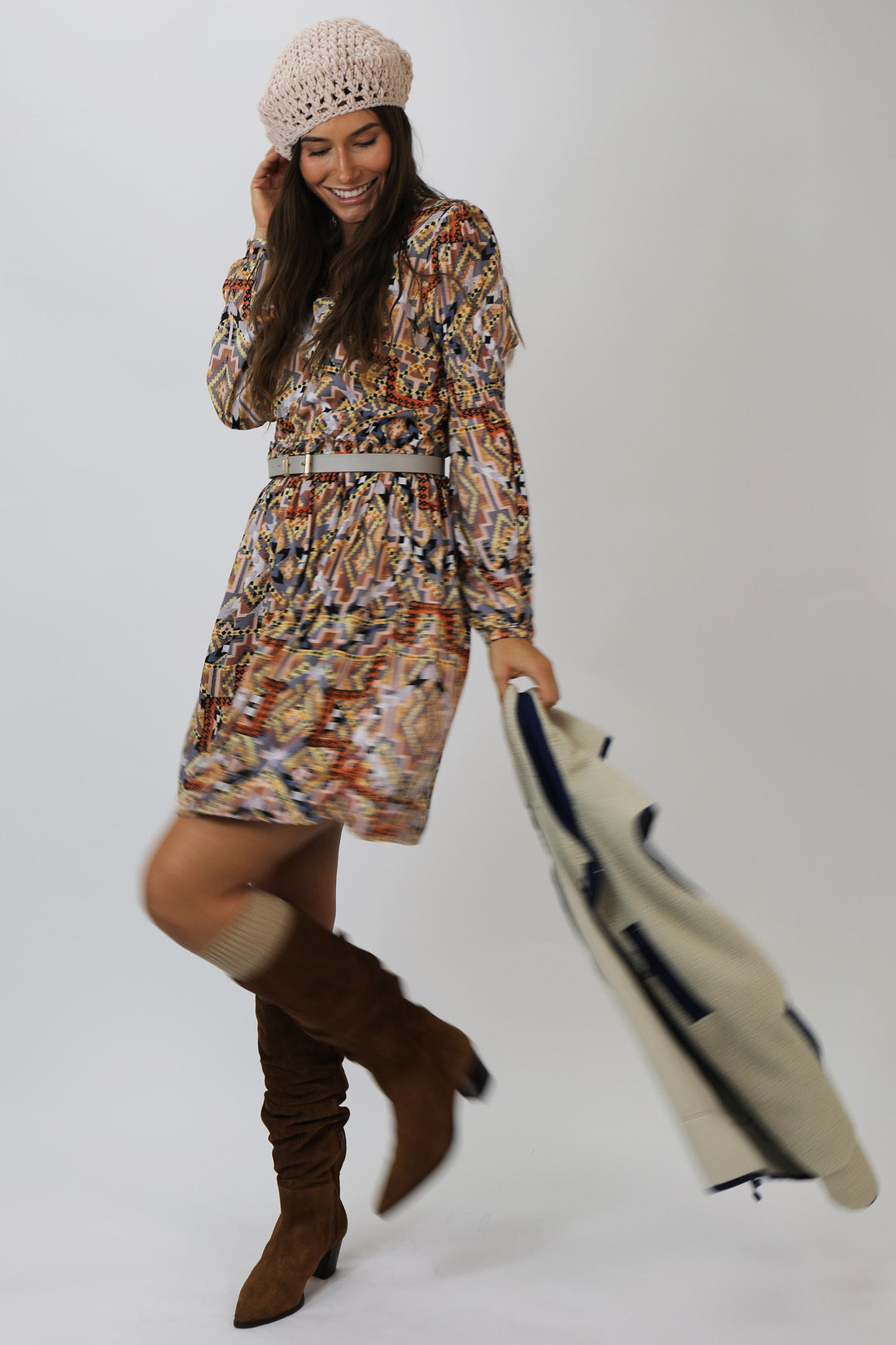 image of a female model wearing a SELAH RUFFLE AUTUMN GLAZED NAVAHO DRESS DEAR JOHN DENIM 