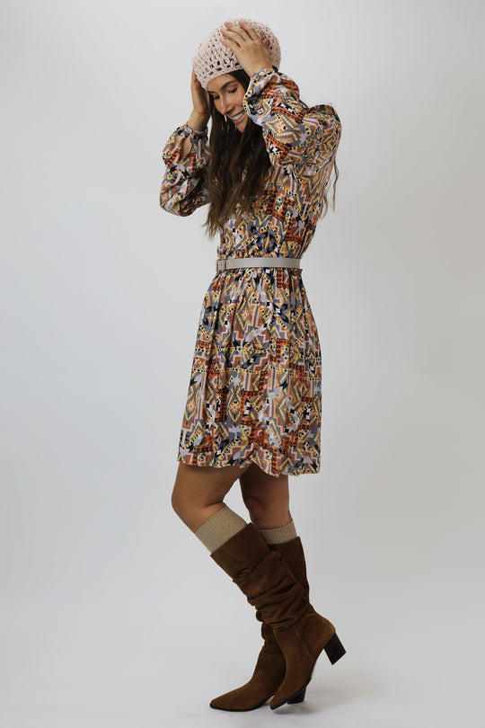 image of a female model wearing a SELAH RUFFLE AUTUMN GLAZED NAVAHO DRESS DEAR JOHN DENIM 