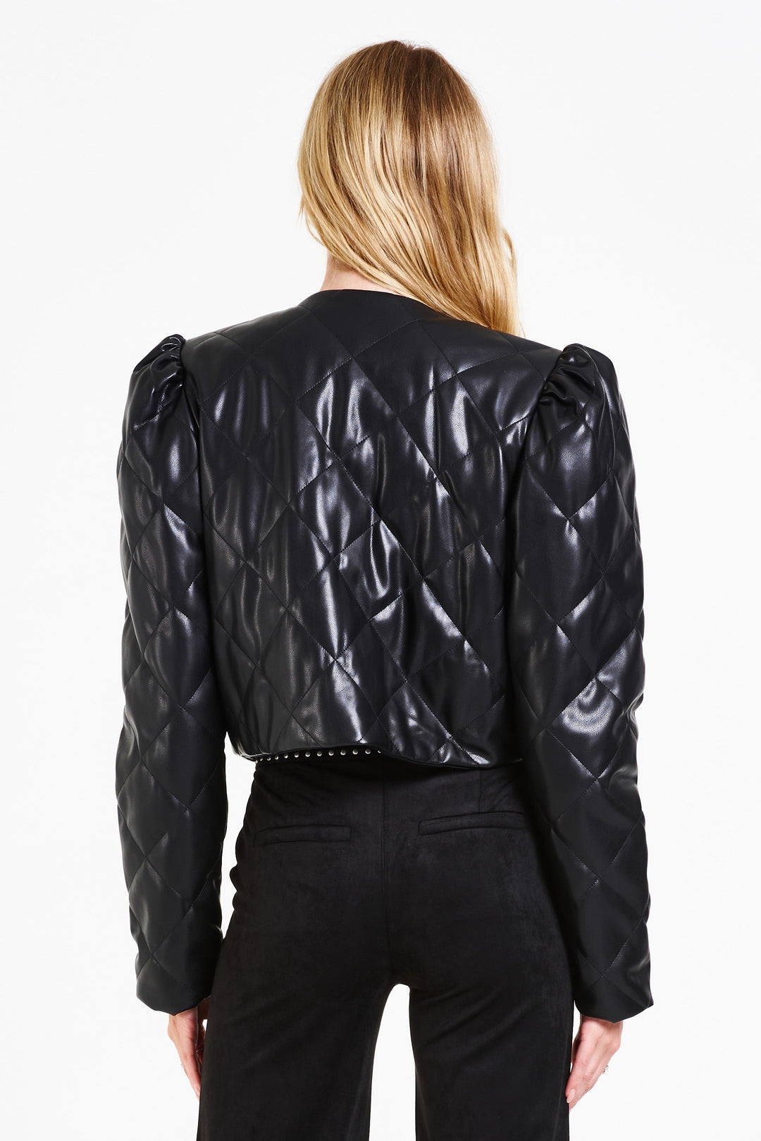 image of a female model wearing a OLYMPIA CROPPED JACKET BLACK QUILTED JACKETS