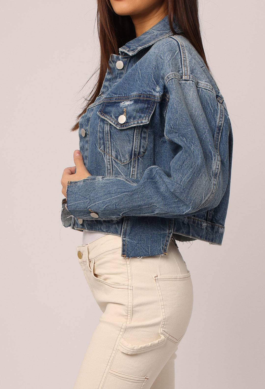image of a female model wearing a EMMY CROPPED DENIM JACKET MID CITY JACKETS