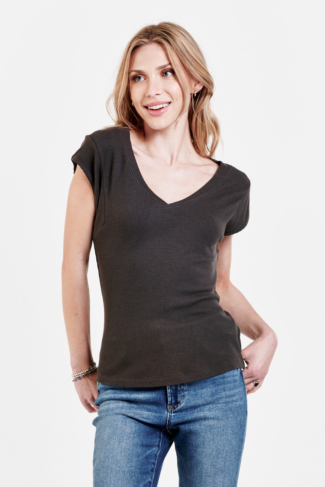 image of a female model wearing a URI THERMAL V-NECK TOP ONYX DEAR JOHN DENIM 