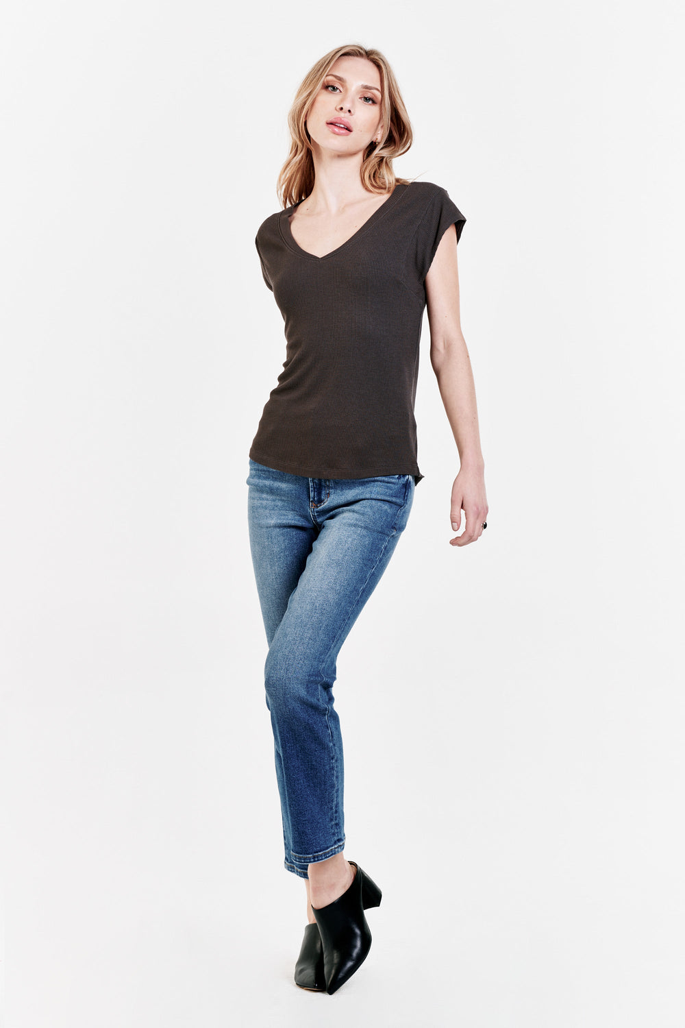 image of a female model wearing a URI THERMAL V-NECK TOP ONYX TOPS