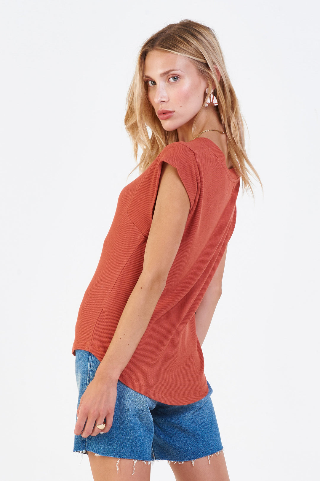 image of a female model wearing a URI THERMAL V-NECK TOP RED CLAY DEAR JOHN DENIM 