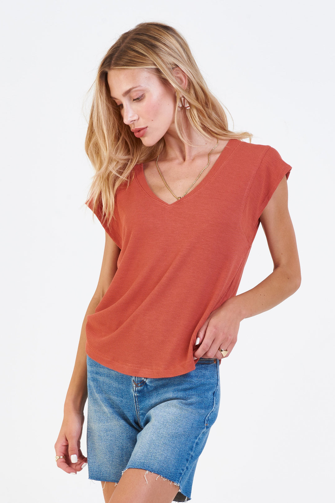 image of a female model wearing a URI THERMAL V-NECK TOP RED CLAY DEAR JOHN DENIM 