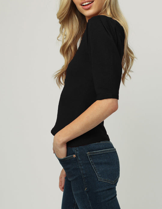 image of a female model wearing a ISLA PUFFED SHORT SLEEVE TOP BLACK SWEATERS
