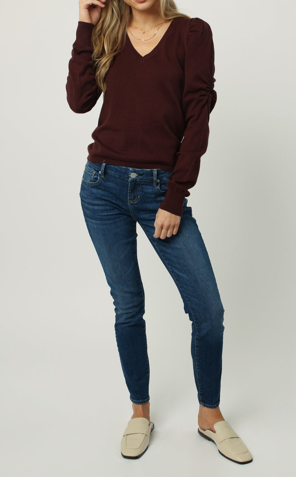 image of a female model wearing a LILLY LONG SLEEVE V-NECK SWEATER HICKORY SWEATERS