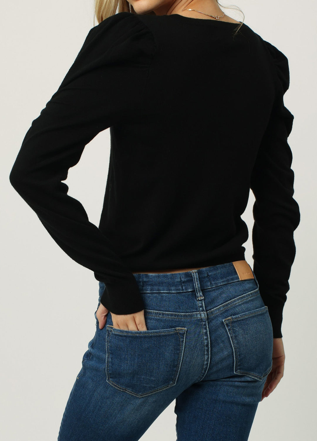 image of a female model wearing a LILLY LONG SLEEVE V-NECK SWEATER BLACK DEAR JOHN DENIM 