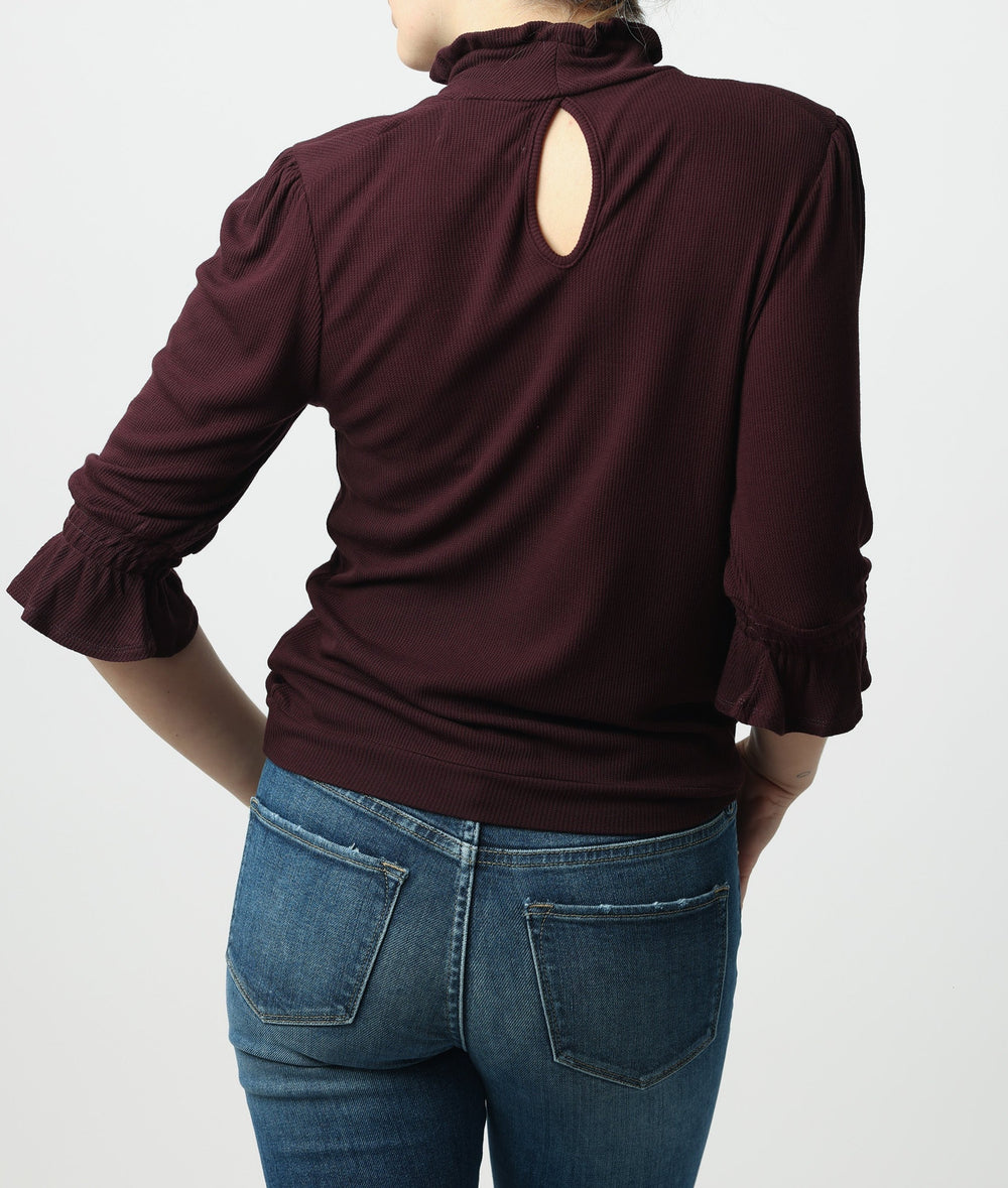 image of a female model wearing a GWEN RUFFLE SLEEVE TOP BOYSENBERRY DEAR JOHN DENIM 