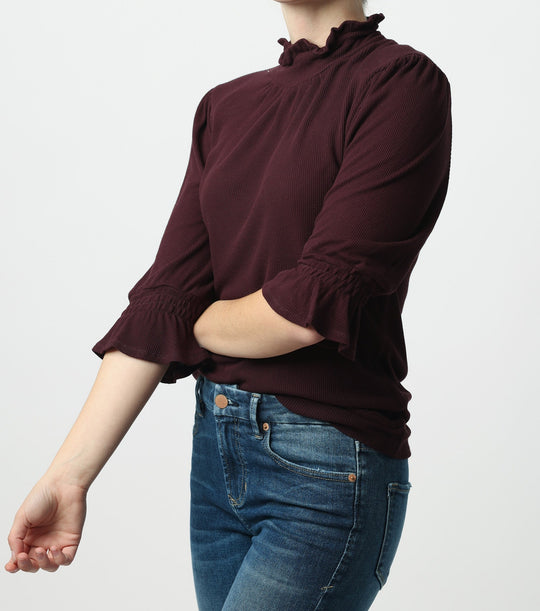 image of a female model wearing a GWEN RUFFLE SLEEVE TOP BOYSENBERRY DEAR JOHN DENIM 