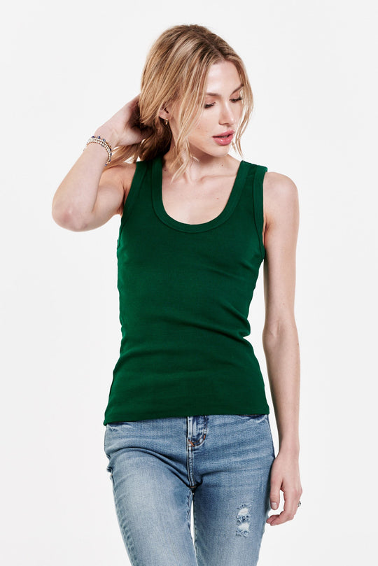 image of a female model wearing a PAULA SCOOP TANK DARTMOUTH GREEN TANKS