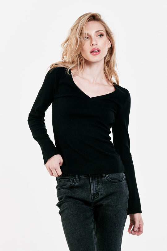image of a female model wearing a SCARLETT V-NECK TOP BLACK DEAR JOHN DENIM 