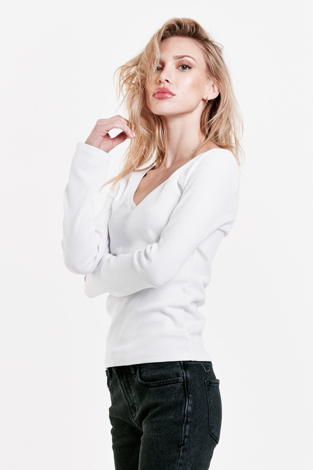 image of a female model wearing a SCARLETT V-NECK TOP WHITE DEAR JOHN DENIM 