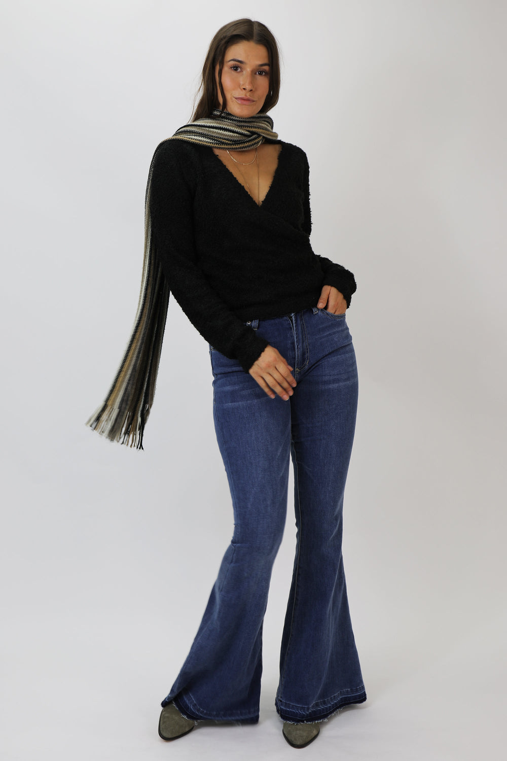 image of a female model wearing a KARA SUPER HIGH RISE SUPER FLARE TIDE JEANS DEAR JOHN DENIM 