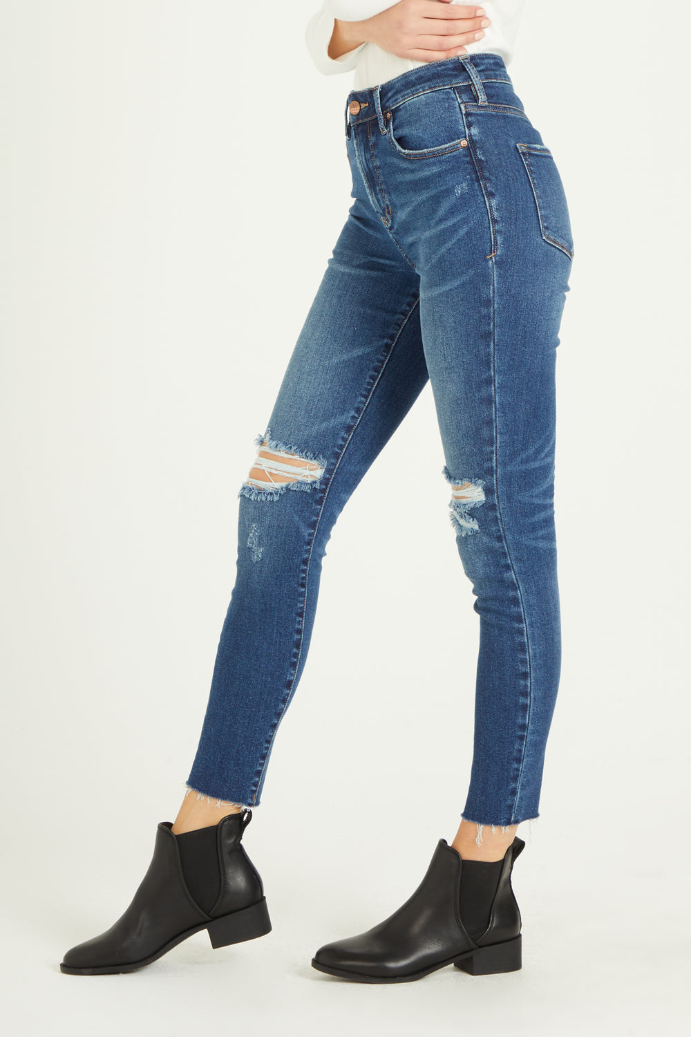 image of a female model wearing a 10 1/2" SUPER HIGH RISE OLIVIA SKINNY VALENCIA JEANS