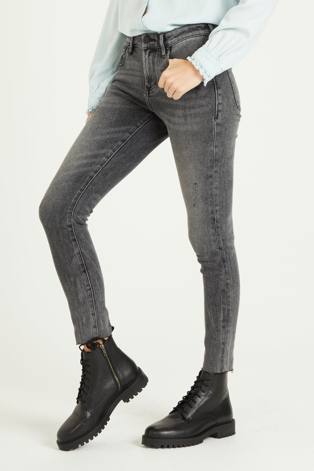 image of a female model wearing a 9 1/2" HIGH RISE GISELE SKINNY IN QUEBEC DEAR JOHN DENIM 