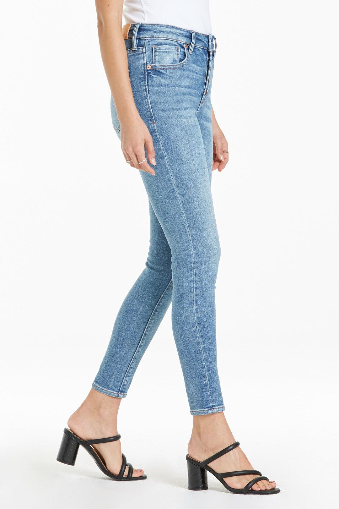 image of a female model wearing a OLIVIA SUPER HIGH RISE ANKLE SKINNY JEANS CORONADO JEANS