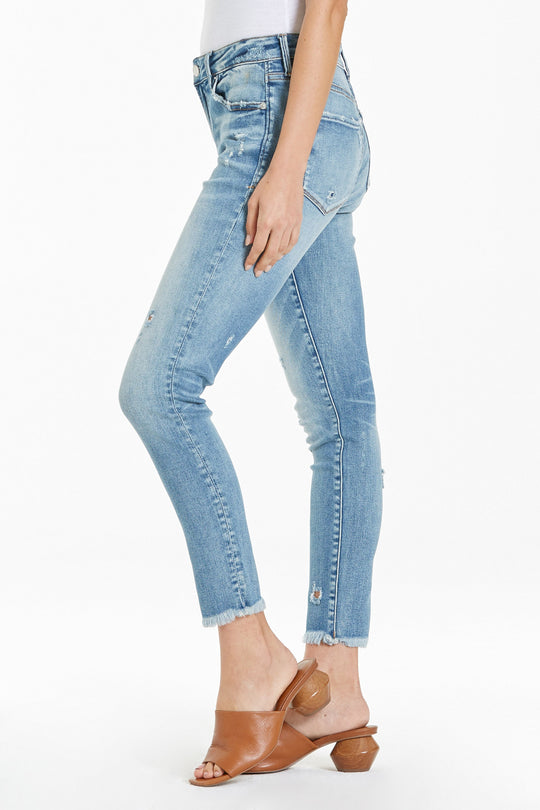 image of a female model wearing a GISELE HIGH RISE ANKLE SKINNY JEANS WATERFRONT JEANS
