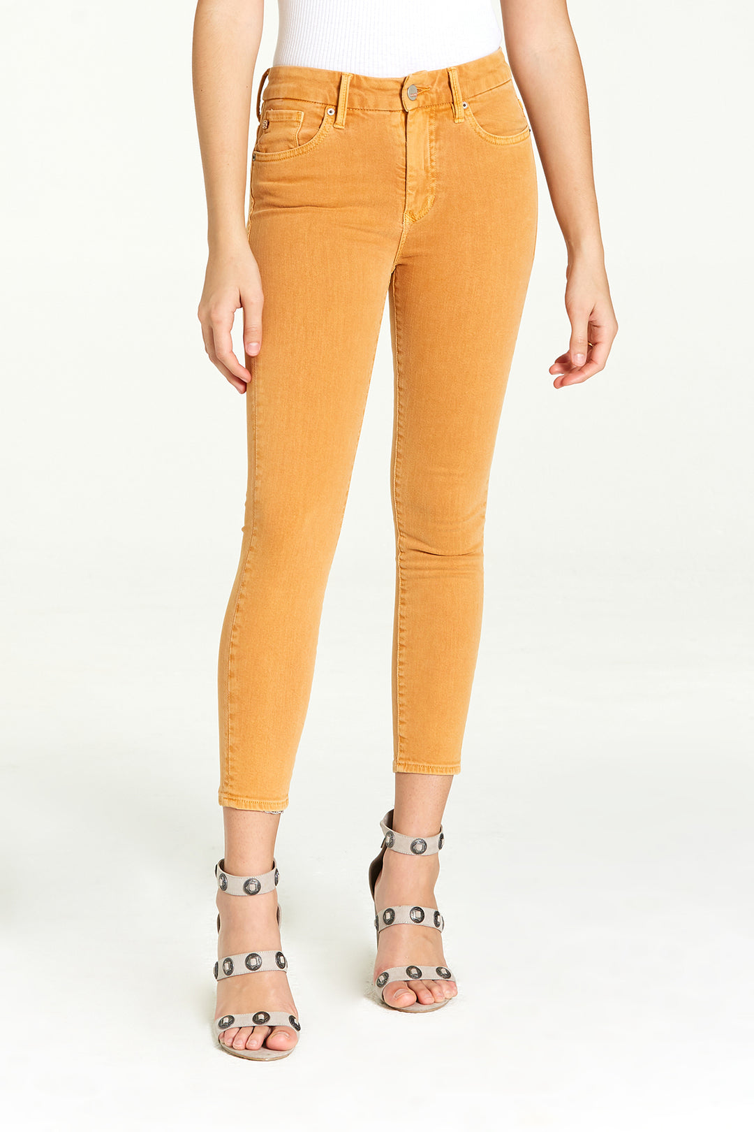 image of a female model wearing a 10" PIXIE SKINNY MIMOSA JEANS