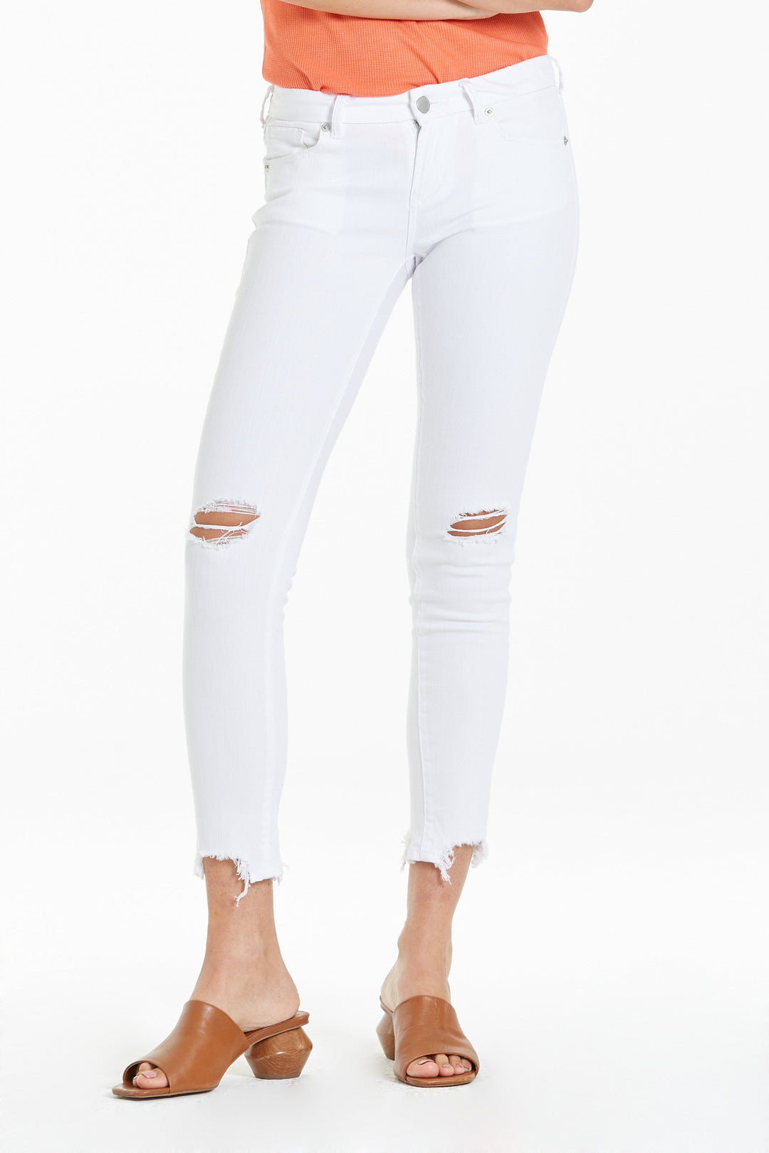 image of a female model wearing a JOYRICH MID RISE ANKLE SKINNY JEANS OPTIC WHITE JEANS
