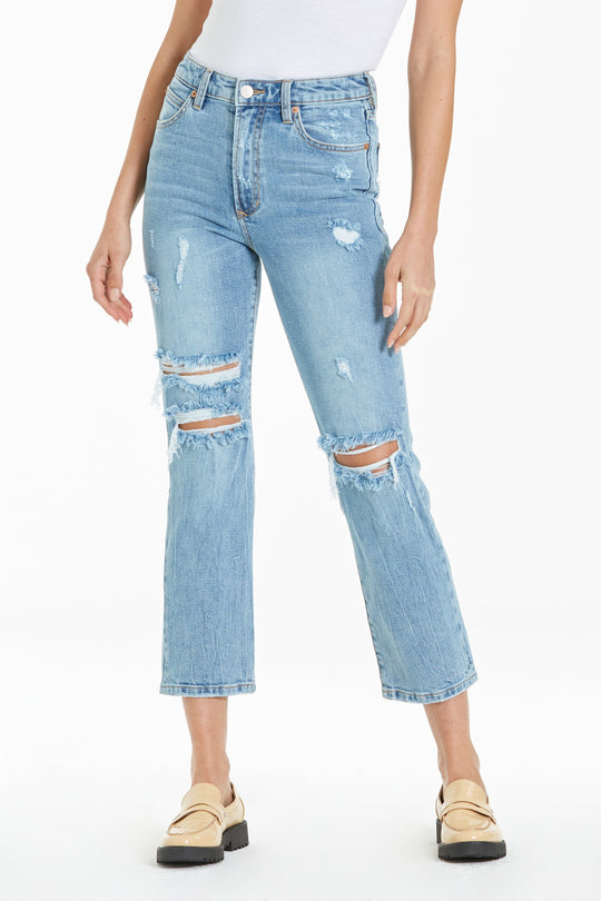 image of a female model wearing a FRANKIE SUPER HIGH RISE CROPPED STRAIGHT JEANS EVERGLADES DEAR JOHN DENIM 