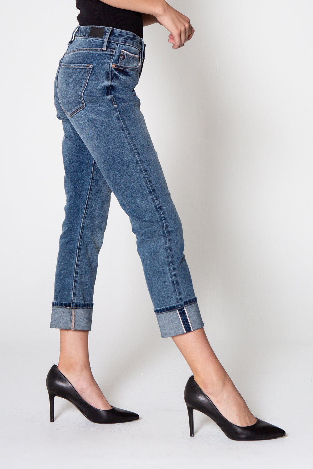 image of a female model wearing a 9 1/2" BLAIRE HIGH RISE SLIM STRAIGHT IN COTTON DEAR JOHN DENIM 