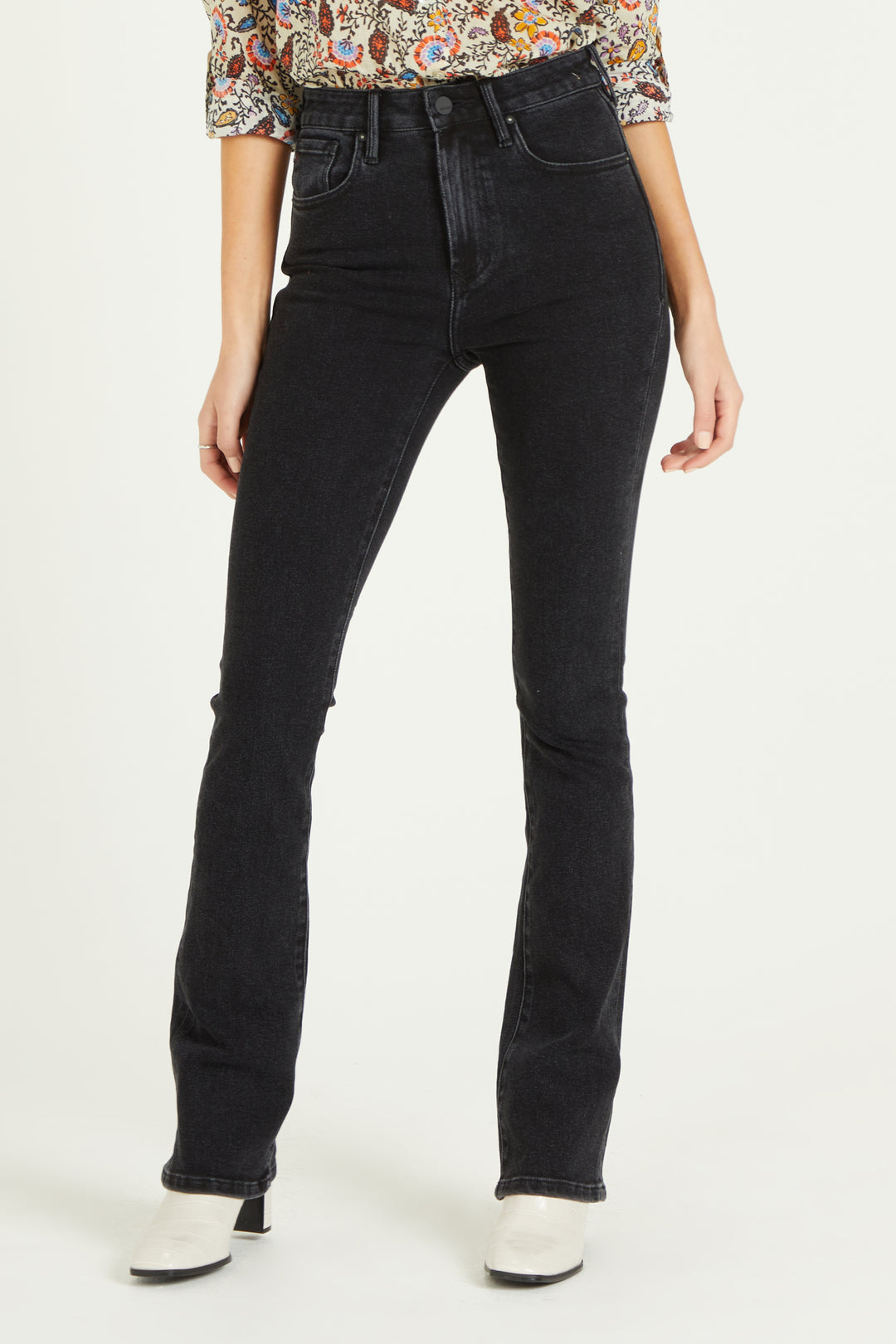 image of a female model wearing a 11" SUPER HIGH RISE ROBBIE FLARE IN BLACK TRAIL JEANS