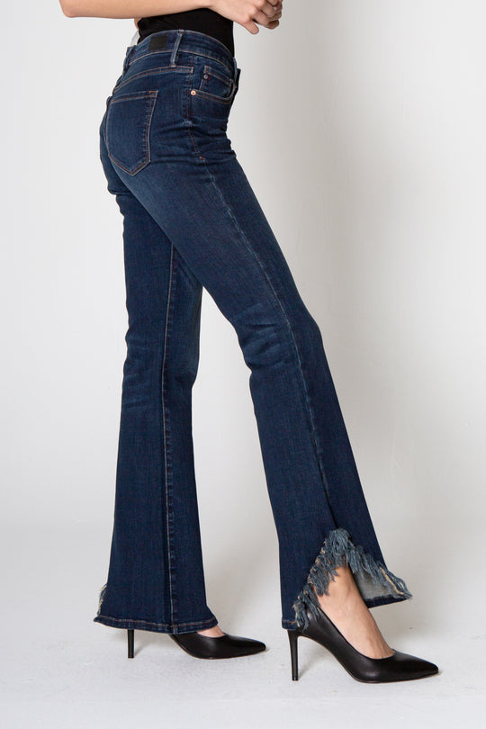 image of a female model wearing a 9 1/2" MID RISE ROSIE FLARE IN BIXBY DEAR JOHN DENIM 