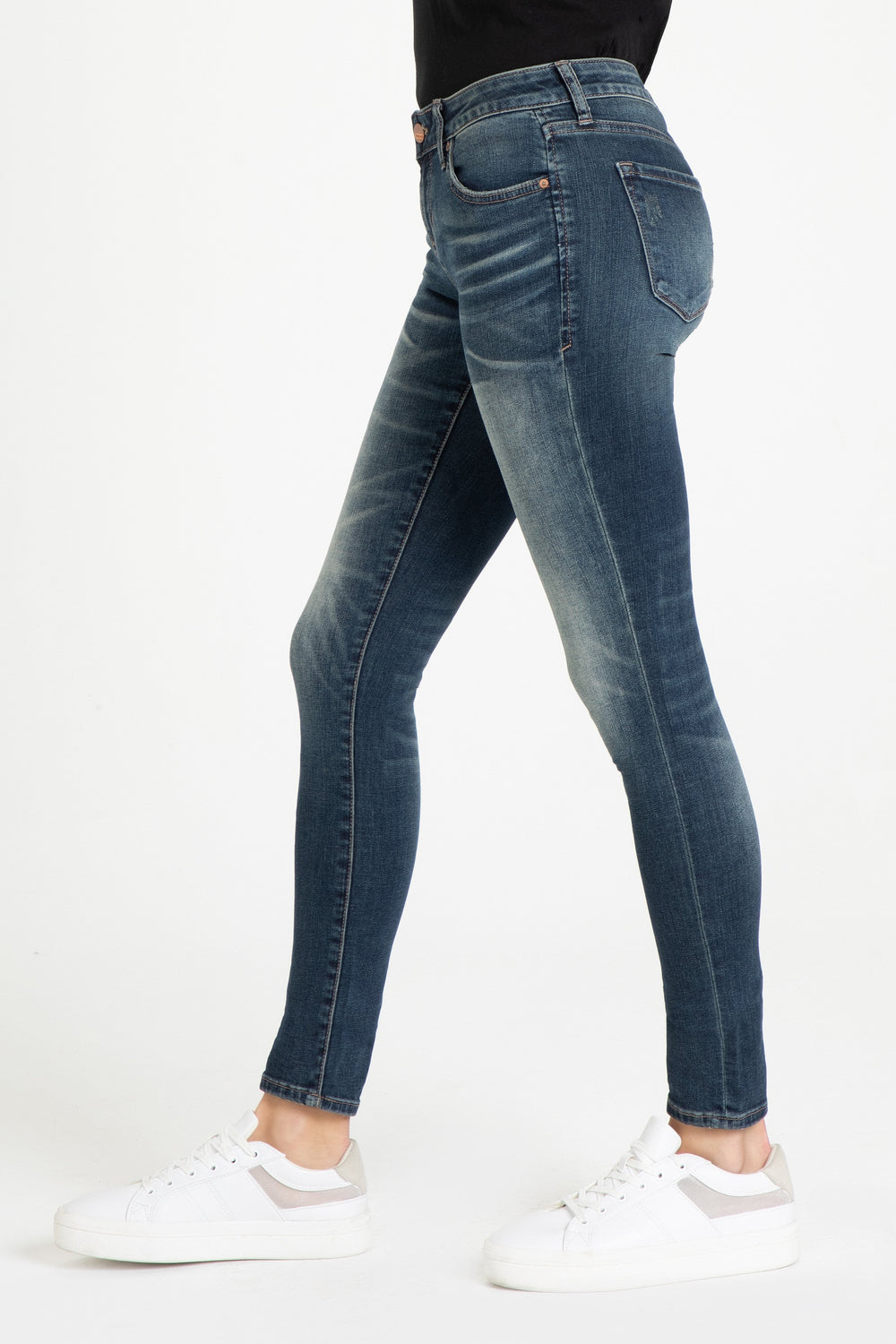 image of a female model wearing a JOYRICH MID RISE SKINNY JEANS KIRBY JEANS