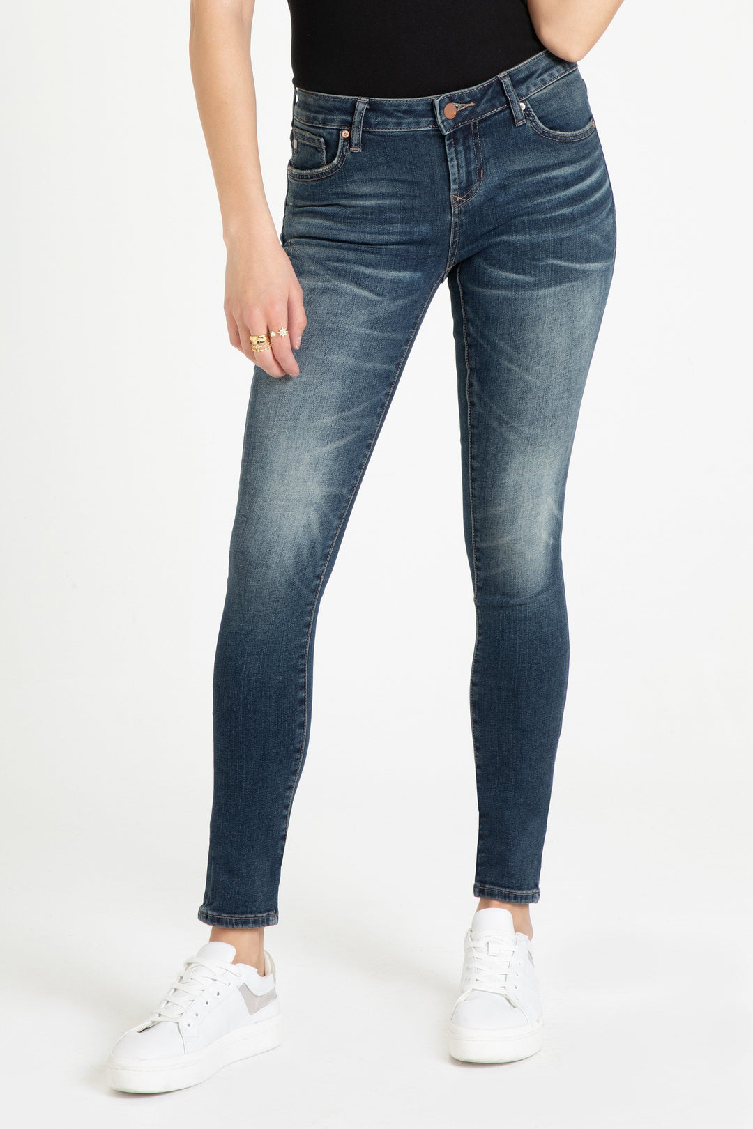 image of a female model wearing a JOYRICH MID RISE SKINNY JEANS KIRBY JEANS