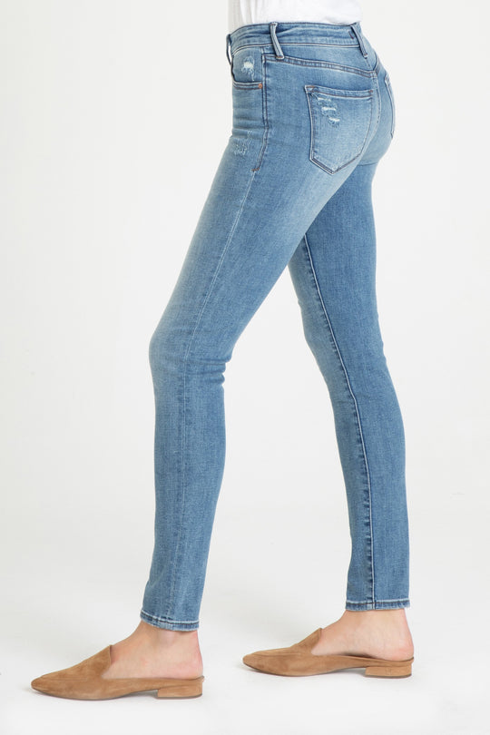 image of a female model wearing a JOYRICH MID RISE SKINNY JEANS PATHWAY JEANS