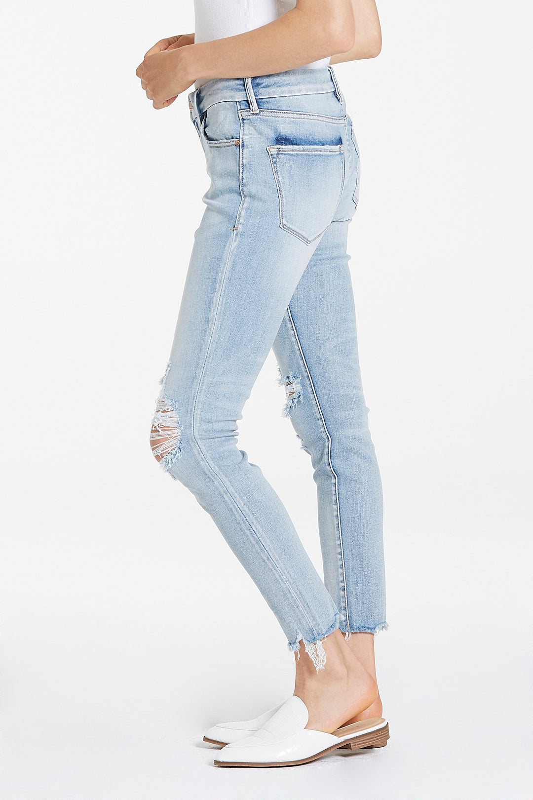 image of a female model wearing a JOYRICH MID RISE ANKLE SKINNY JEANS REEF BEACH JEANS