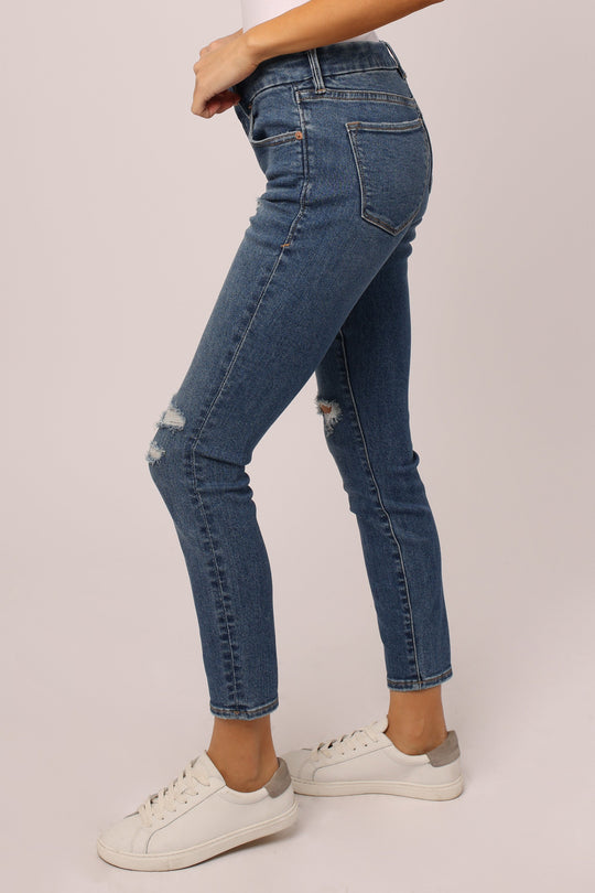 image of a female model wearing a JOYRICH MID RISE ANKLE SKINNY JEANS BENFIELD JEANS