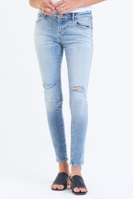 image of a female model wearing a JOYRICH MID RISE SKINNY JEANS ROSEMONT JEANS