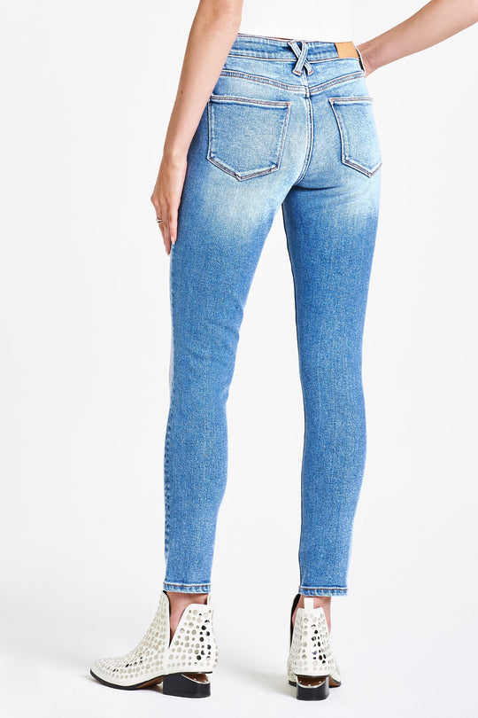 image of a female model wearing a OLIVIA SUPER HIGH RISE ANKLE SKINNY JEANS WEST CORONADO JEANS