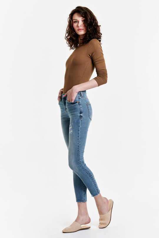 image of a female model wearing a GISELE HIGH RISE ANKLE SKINNY JEANS TAHITI DEAR JOHN DENIM 