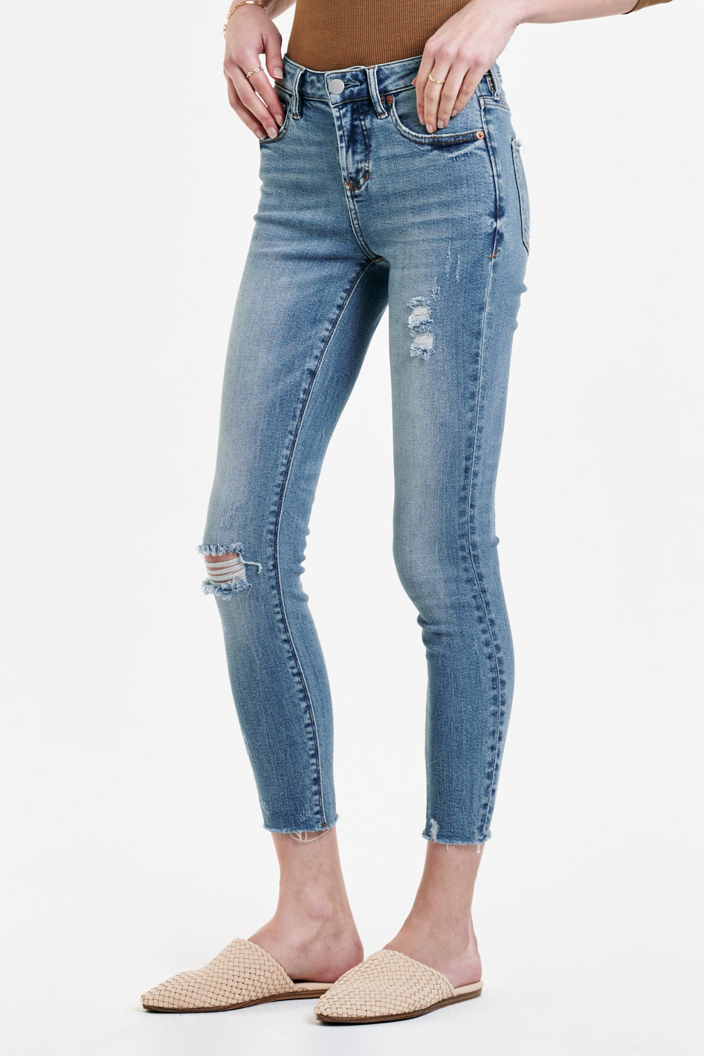 image of a female model wearing a GISELE HIGH RISE ANKLE SKINNY JEANS TAHITI JEANS