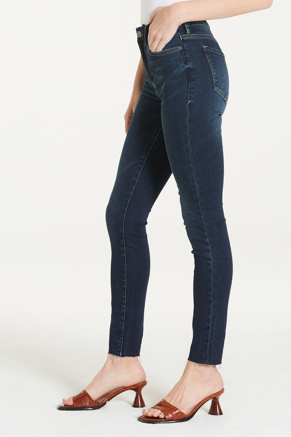 image of a female model wearing a PIXIE HIGH RISE ANKLE SKINNY ROCKLAND JEANS DEAR JOHN DENIM 