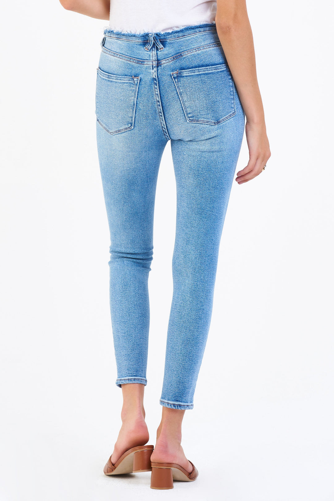 image of a female model wearing a OLIVIA SUPER HIGH RISE ANKLE SKINNY JEANS GALLANT JEANS