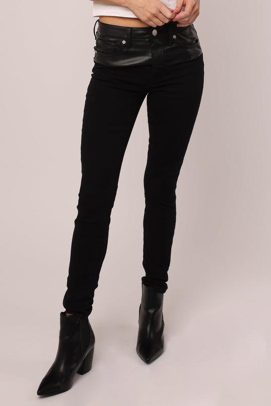 image of a female model wearing a PIXIE HIGH RISE ANKLE CROPPED SKINNY JEANS BLACK DEAR JOHN DENIM 
