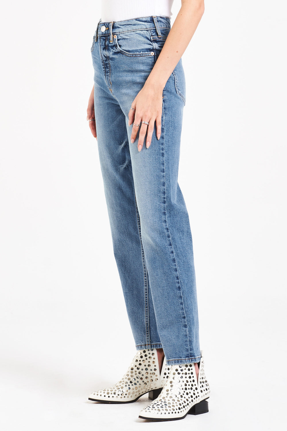 image of a female model wearing a 90S ULTRA HIGH RISE ANKLE STRAIGHT LEG JEANS EXPLORER JEANS