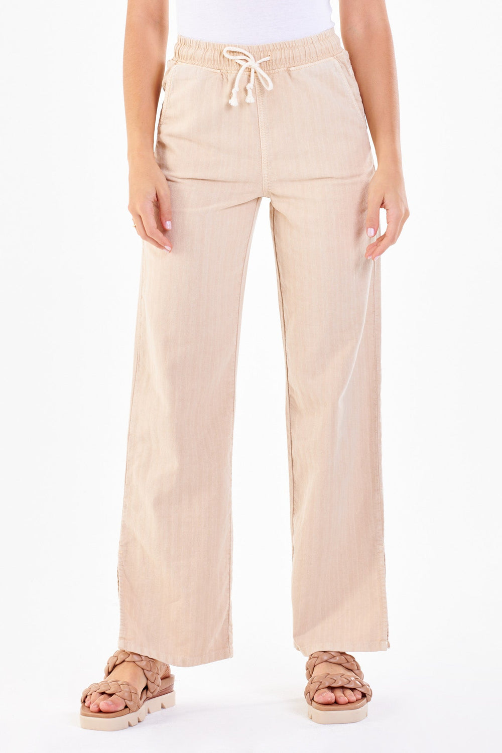 image of a female model wearing a KAYLA HIGH RISE FLARE LEG PANTS OATMEAL DEAR JOHN DENIM 