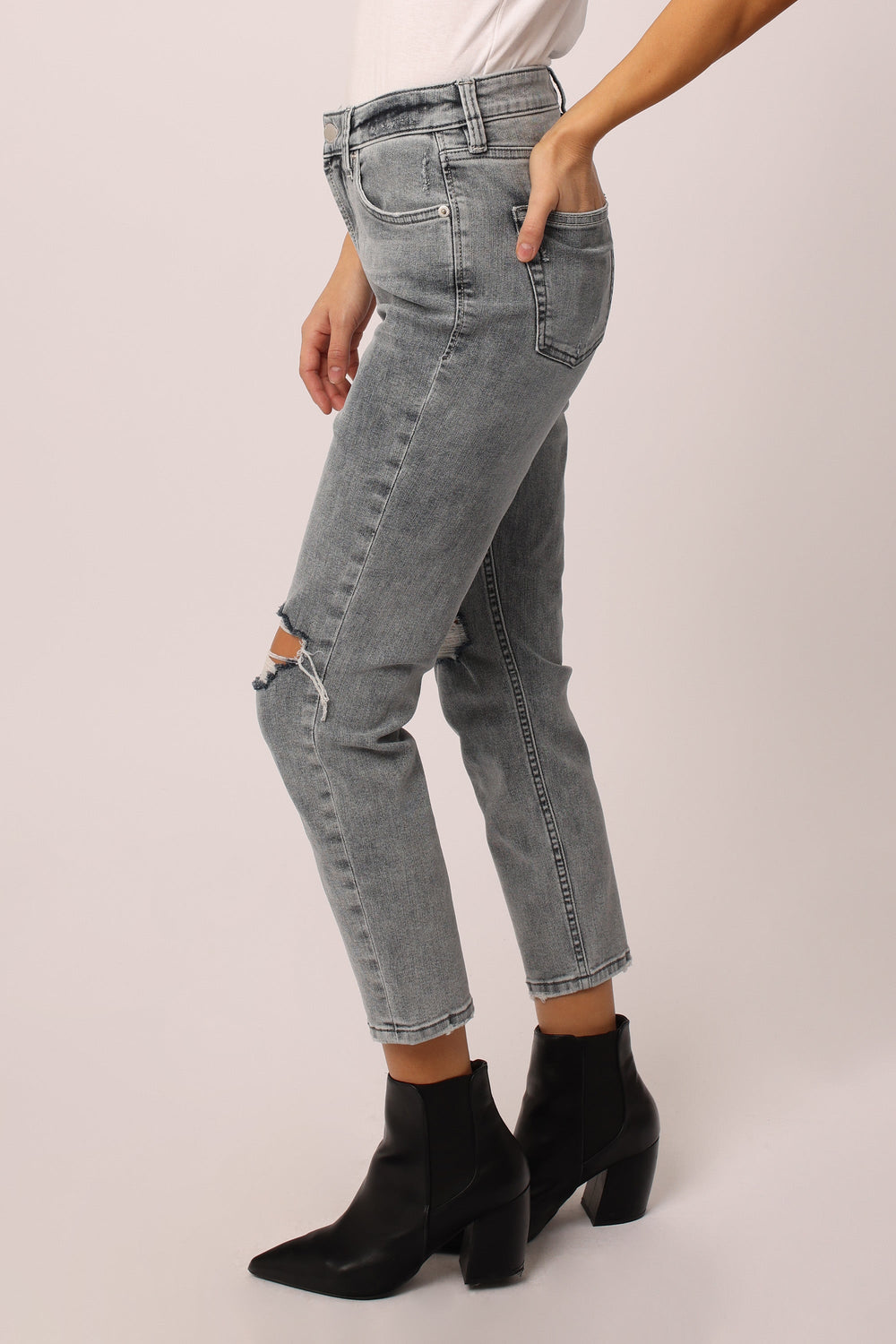 image of a female model wearing a ROXIE SUPER HIGH RISE CROPPED MOM JEANS WEST FAIRFAX DEAR JOHN DENIM 