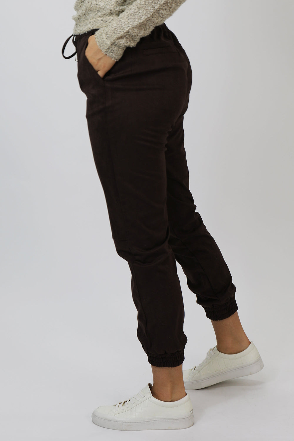 image of a female model wearing a JACEY SUPER HIGH RISE CROPPED JOGGER PANTS MACAROON PANTS