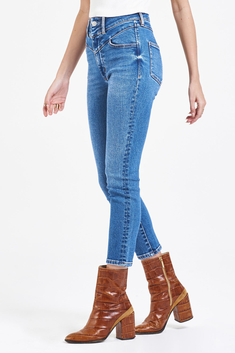 image of a female model wearing a STELLA SUPER HIGH RISE CROPPED SLIM STRAIGHT LEG JEANS FIELDSTONE JEANS
