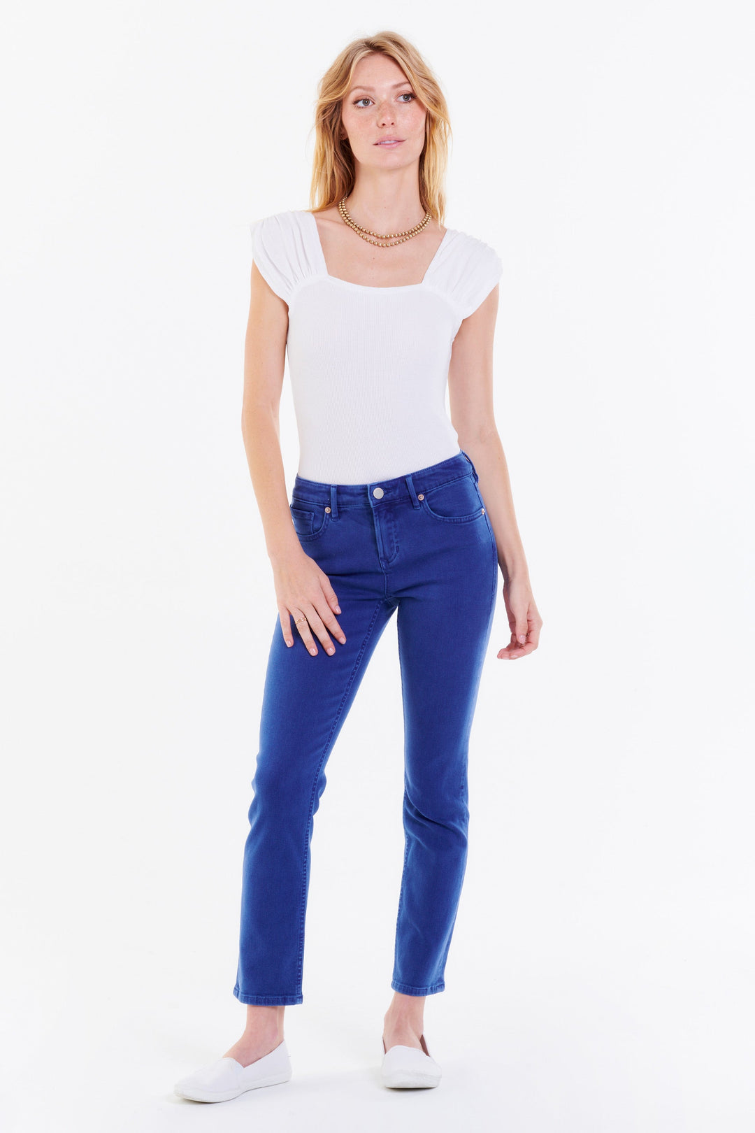image of a female model wearing a BLAIRE HIGH RISE ANKLE SLIM STRAIGHT LEG JEANS NAUTICAL BLUE JEANS