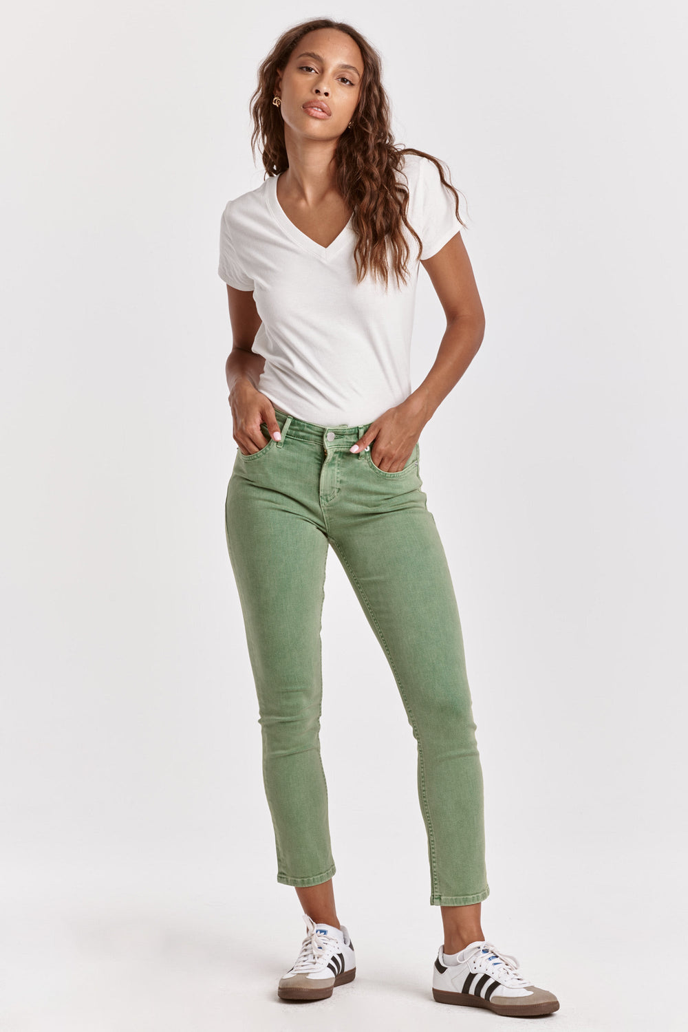 image of a female model wearing a BLAIRE MID RISE SLIM STRAIGHT JEANS NEPHRITE DEAR JOHN DENIM 