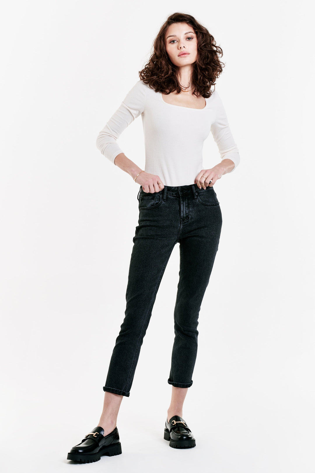 image of a female model wearing a BLAIRE HIGH RISE ANKLE SLIM STRAIGHT JEANS WASHED DOWN BLACK DEAR JOHN DENIM 
